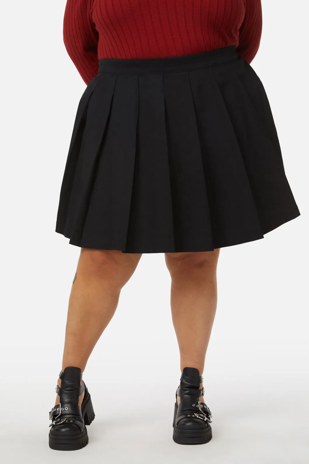 Curve Grave Respect Pleated Skirt